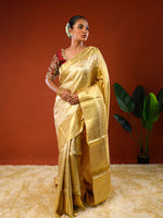 Load image into Gallery viewer, Model wearing Ichchhapuron's Sona saree, a tissue kanjeevaram with a broad golden border and traditional weave