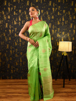 Load image into Gallery viewer, Model wearing Ichchhapuron&#39;s Nava, a green Benarasi saree with meena buti and zari highlight
