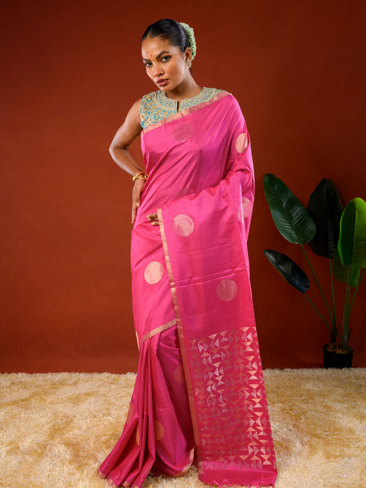 Model wearing Ichchhapuron's Polka - Pink saree, a contemporary polka dotted Kanjeevaram