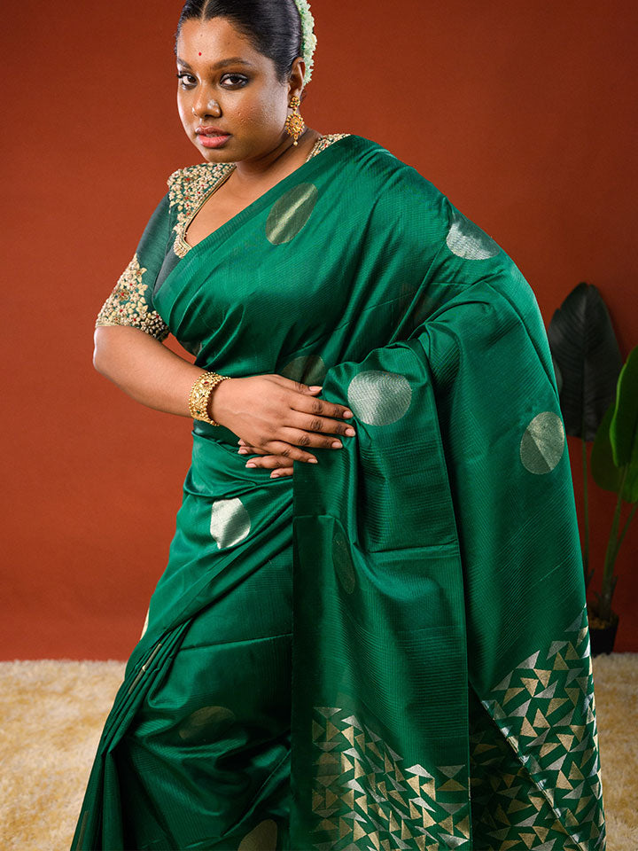 Model wearing Ichchhapuron's Polka - Green saree, a contemporary polka dotted Kanjeevaram