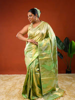 Load image into Gallery viewer, Model wearing Ichchhapuron&#39;s Midori saree, a modern reinterpretation of the Kanjeevaram saree with geometric patterns
