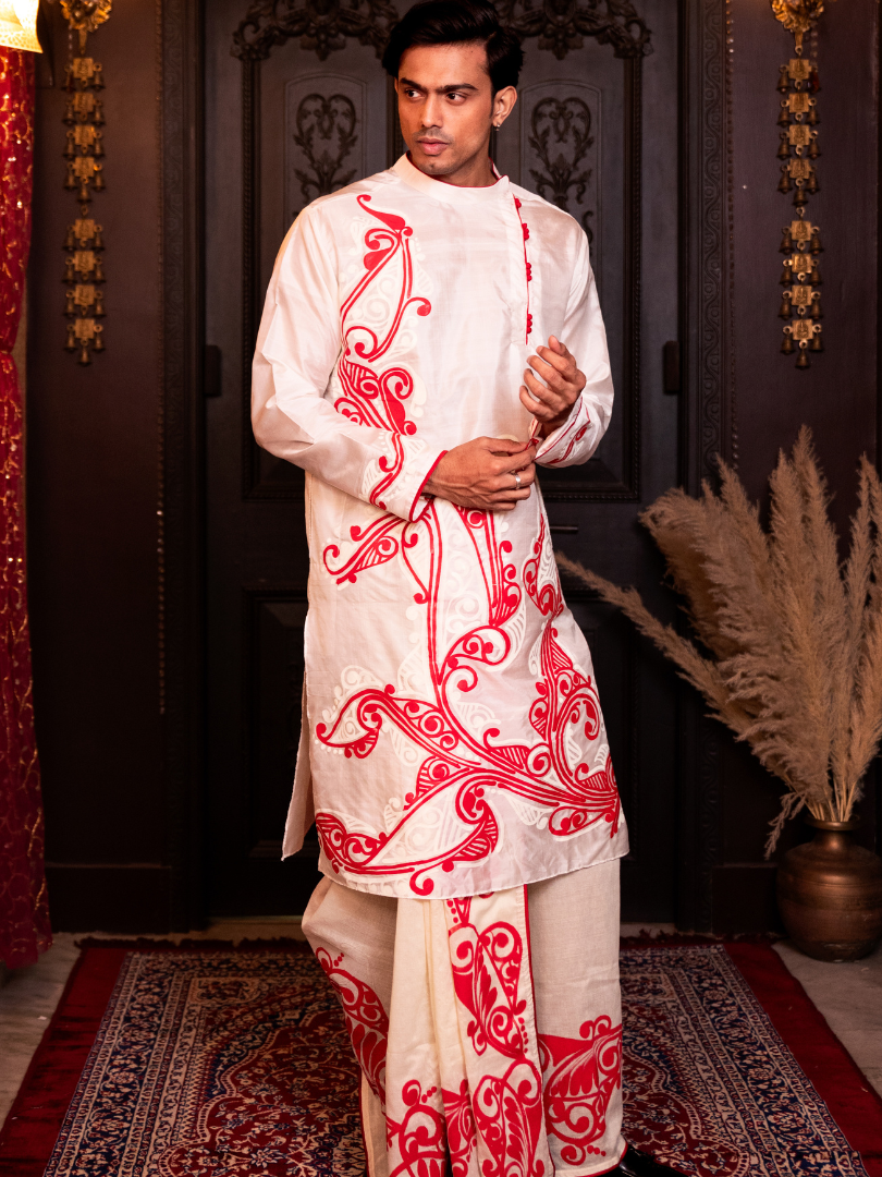 Red alpona on white Dhoti