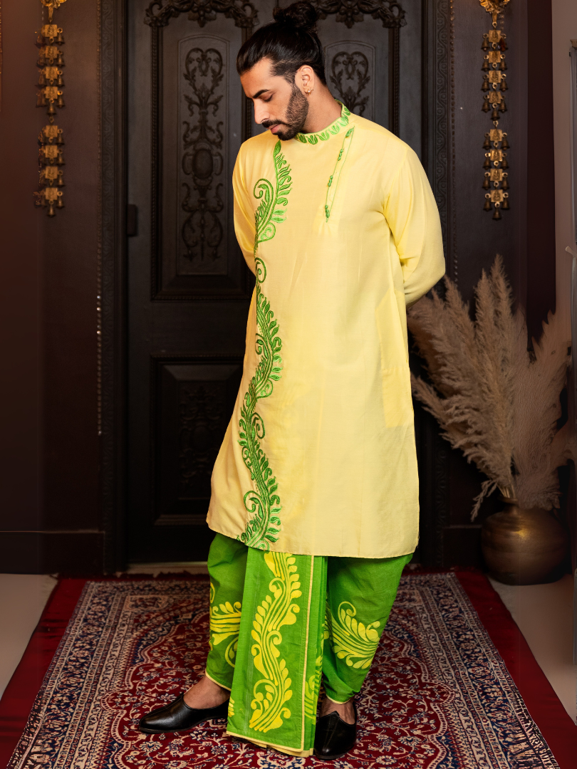 Yellow alpona on green Dhoti