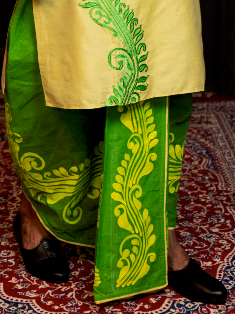 Yellow alpona on green Dhoti